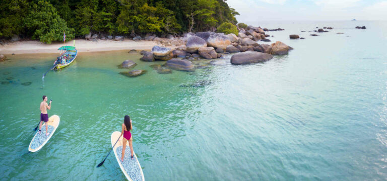 phuket | Anantara Layan Phuket Resort Activity Paddle Board Couple in Ocean Sitecore 1920x900 1920x9001 1