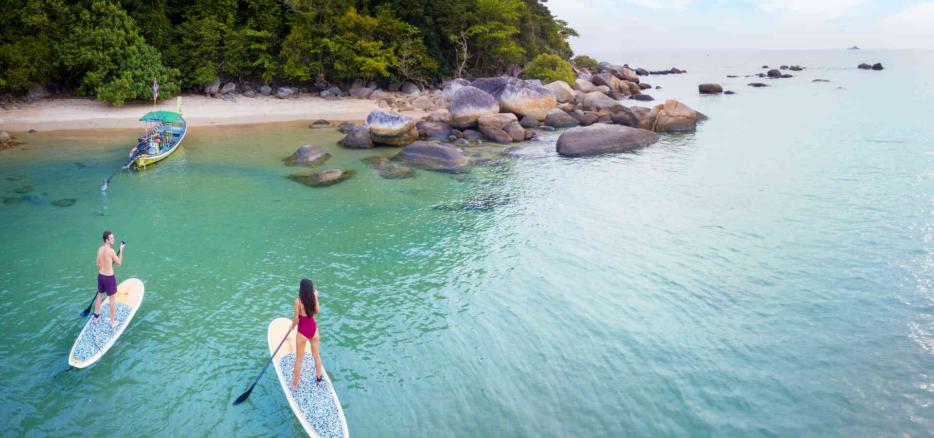 anantara | Anantara Layan Phuket Resort Activity Paddle Board Couple in Ocean Sitecore 1920x900 1920x9001 1