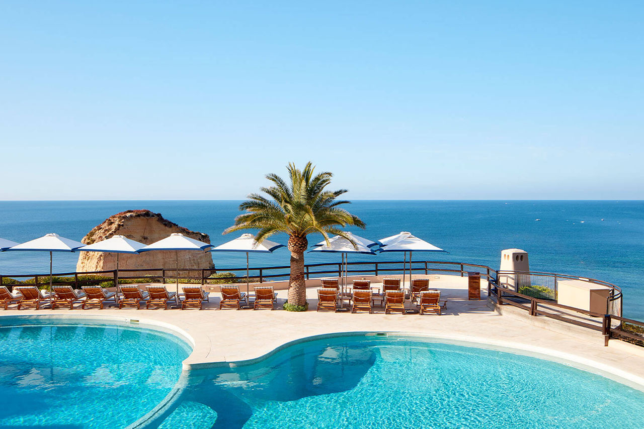 Thalasso | longevity travel VLR pool palmtree